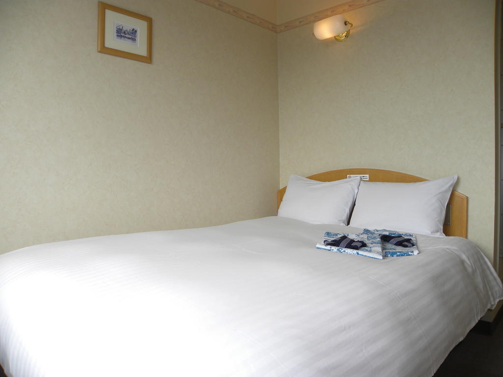 Hotel Benex Yonezawa Quarto foto